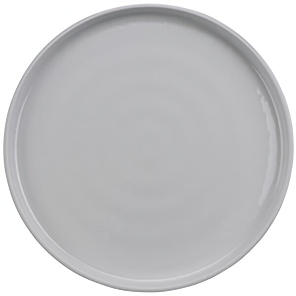 A white plate with a circular rim.