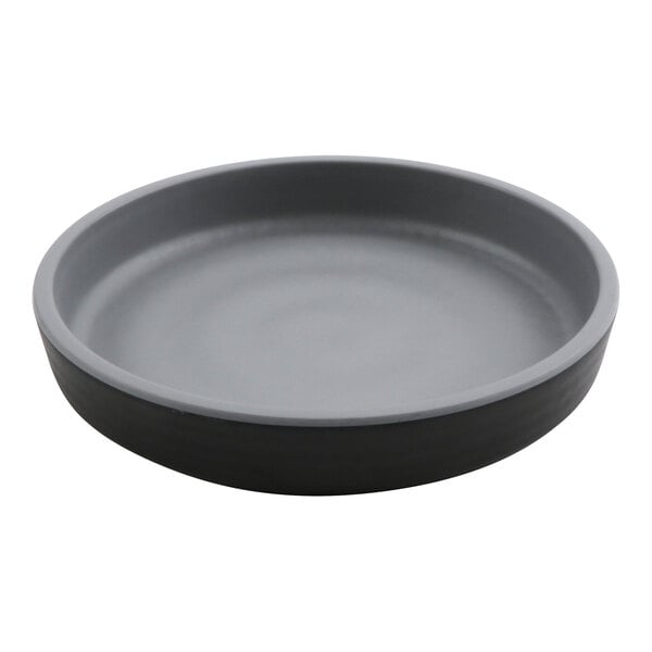 A black GET Roca melamine plate with a rim.