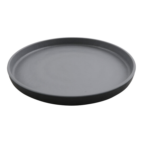 A black round plate with a circular rim on a white background.