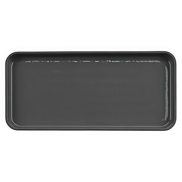 A grey rectangular melamine tray with a black background.