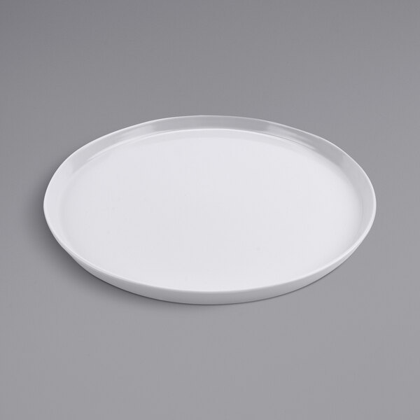 A white GET Diamond melamine plate with a raised rim on a gray surface.