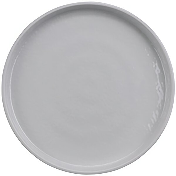 A white melamine plate with a circular rim.