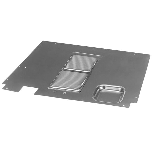 A metal plate with a vent and a small hole in it with the text "Amana Rear Access Panel"