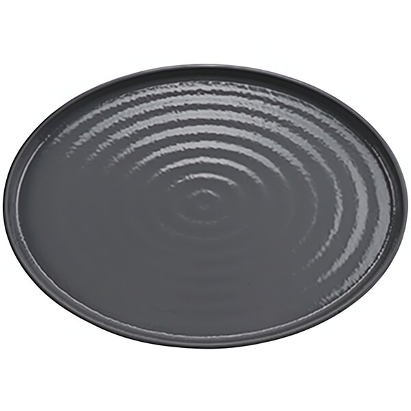 A gray oval melamine platter with a ripple pattern.