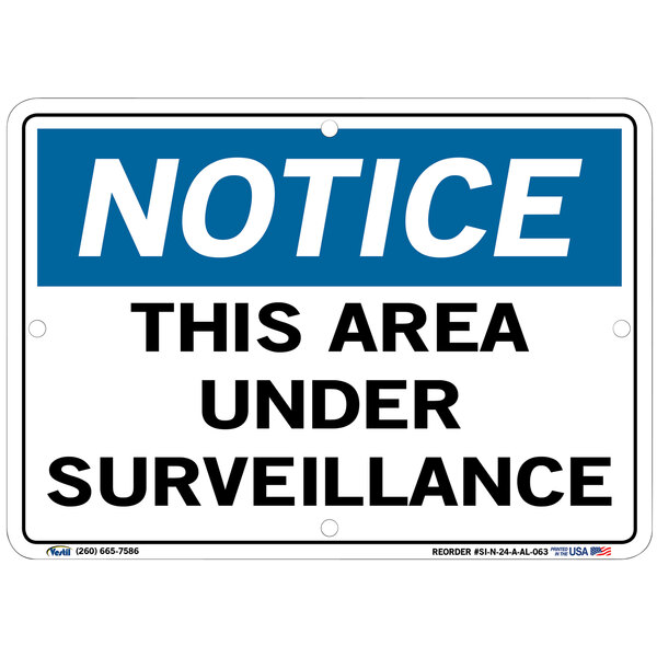 A white and black aluminum sign that says "Notice / This Area Under Surveillance" by Vestil.