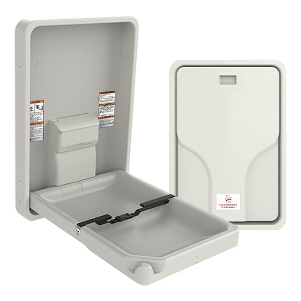 A plastic surface mount vertical baby changing station with a fold-down design and safety strap.