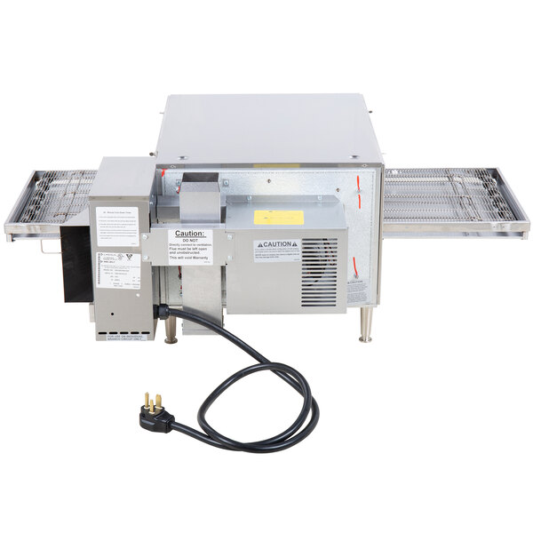 A Lincoln V2500 conveyor oven with a wire attached.