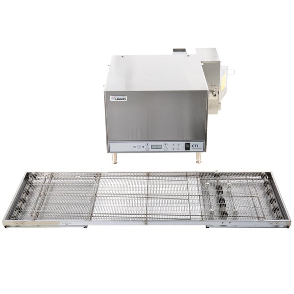 A Lincoln countertop conveyor oven with push-button controls and a digital display.