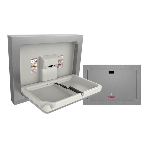 A stainless steel surface mount horizontal baby changing station with a fold-down design and safety strap.