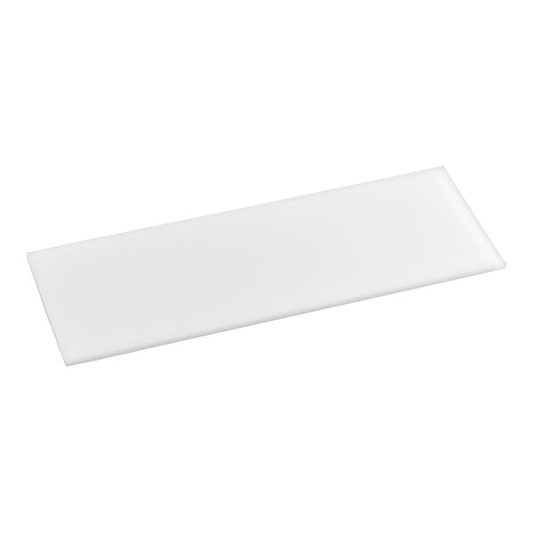 A white rectangular cutting board surface.