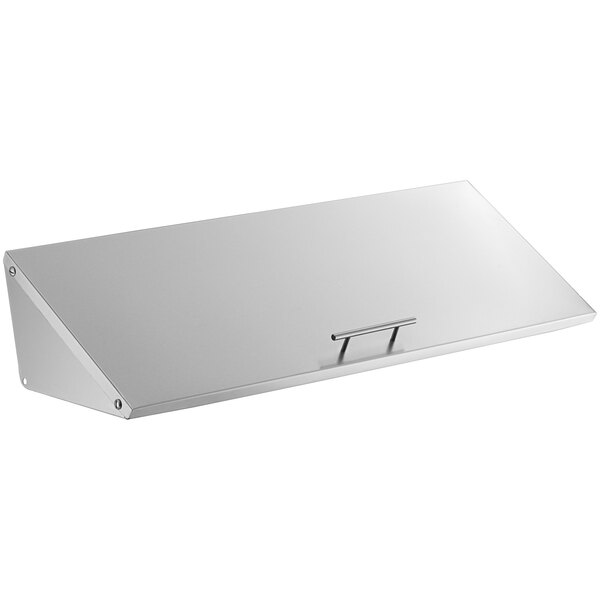 A stainless steel lid with a metal handle for Avantco APST-72 prep tables.