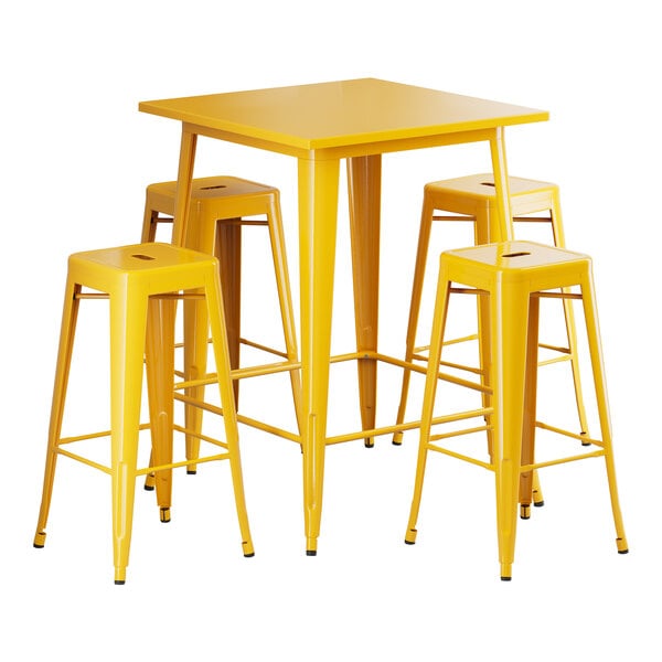 A Lancaster Table & Seating citrine yellow table with four barstools.