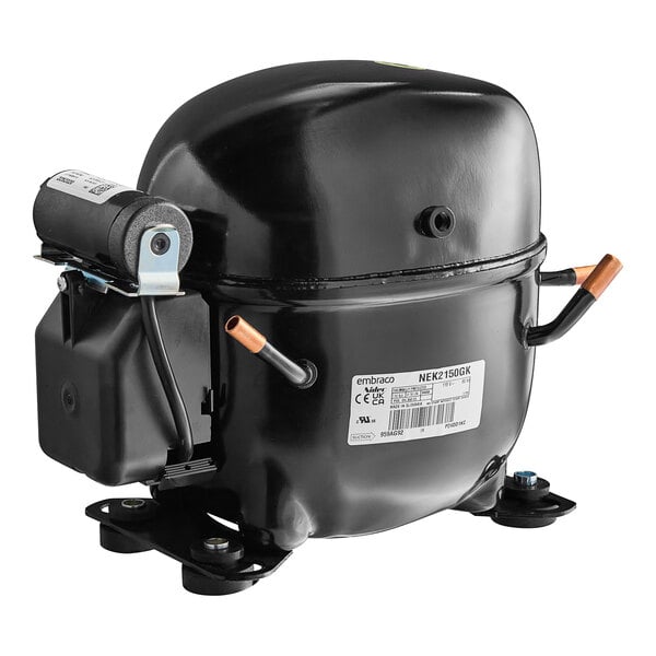 A black refrigeration compressor with a white label.