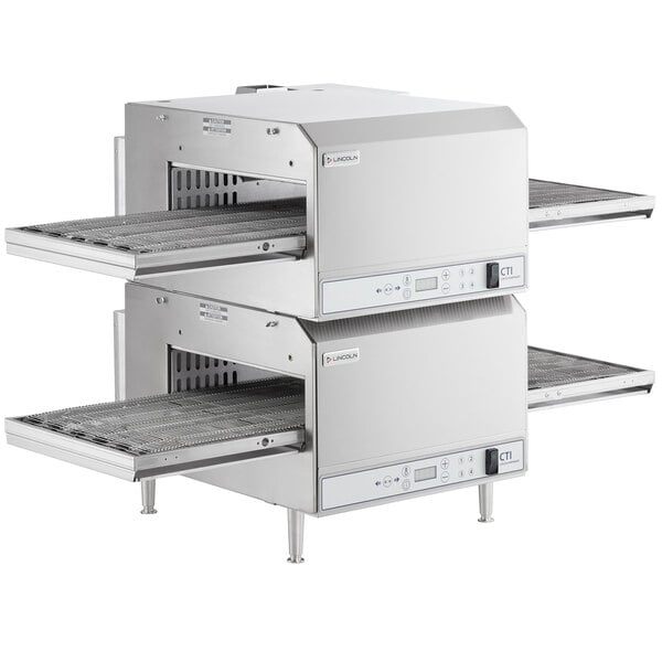 A Lincoln countertop conveyor oven with two stacked shelves.