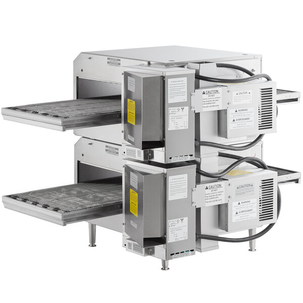 A stack of two Lincoln countertop conveyor ovens with doors open.