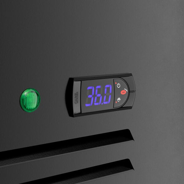 A MainStreet Equipment black swing glass door merchandiser refrigerator with a digital temperature display.