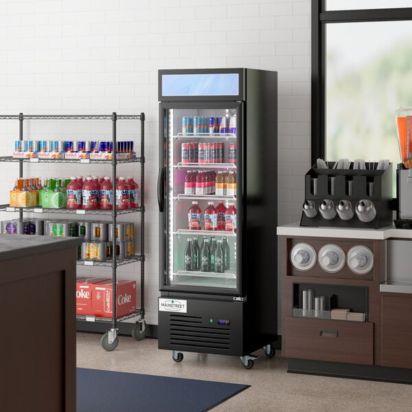 A Main Street Equipment black swing glass door merchandiser refrigerator full of shelves with beverages on them.