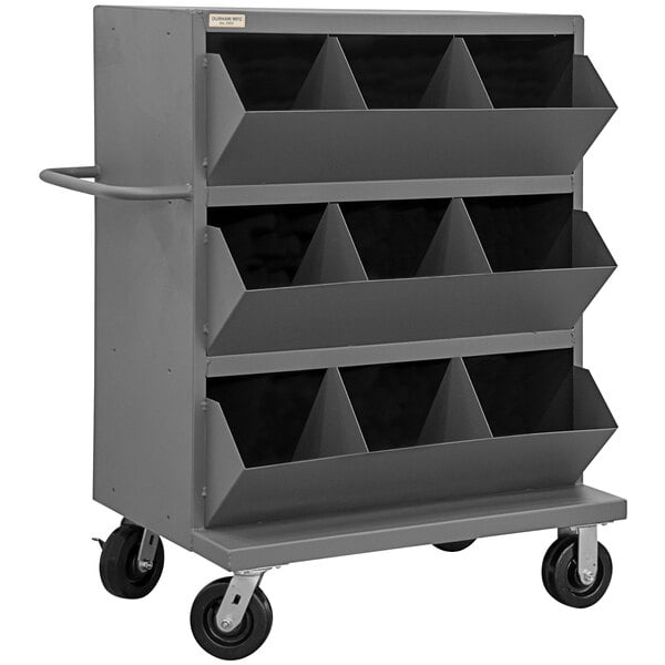A grey metal Durham stock cart with black bin openings.