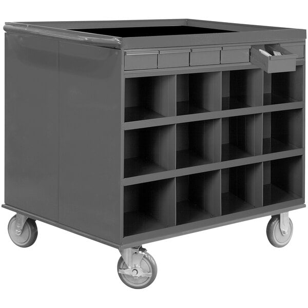 A large metal Durham stock cart with shelves and drawers on wheels.
