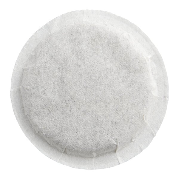 A round, white, fabric-like pod with a stitched edge, viewed from above.