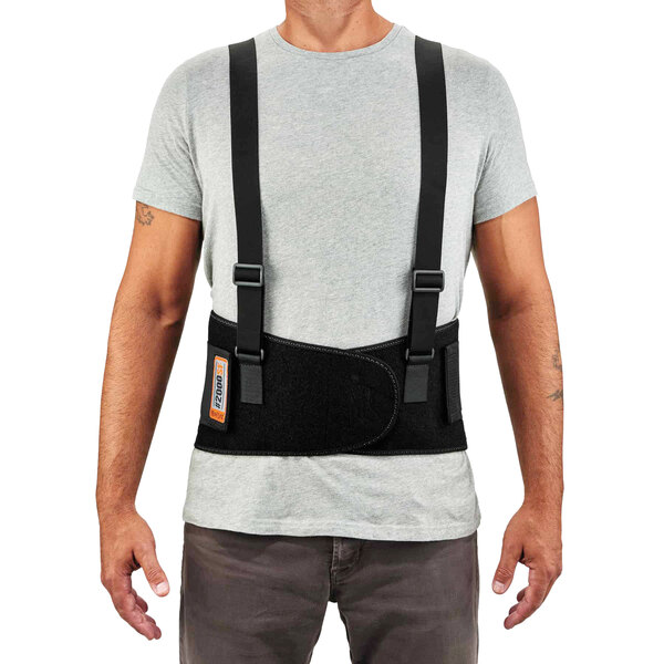 A man wearing an Ergodyne ProFlex 2000SF back brace with suspenders.
