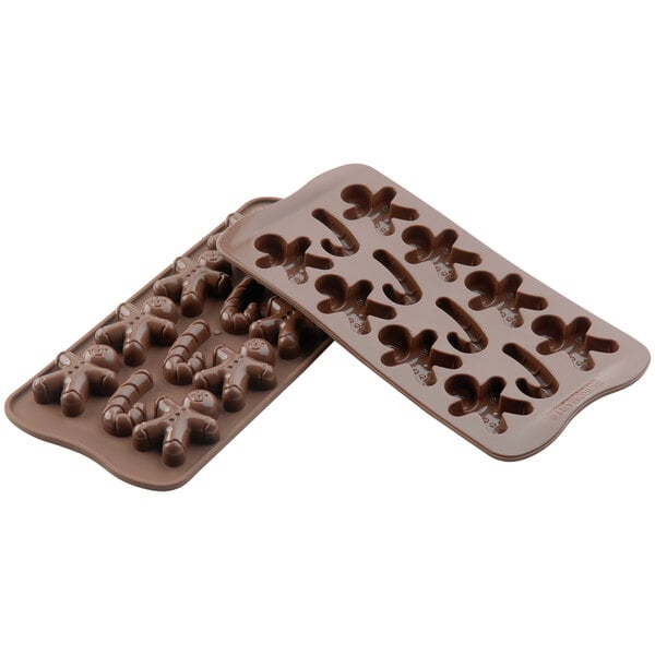 A Silikomart brown silicone chocolate mold with 12 different shapes.