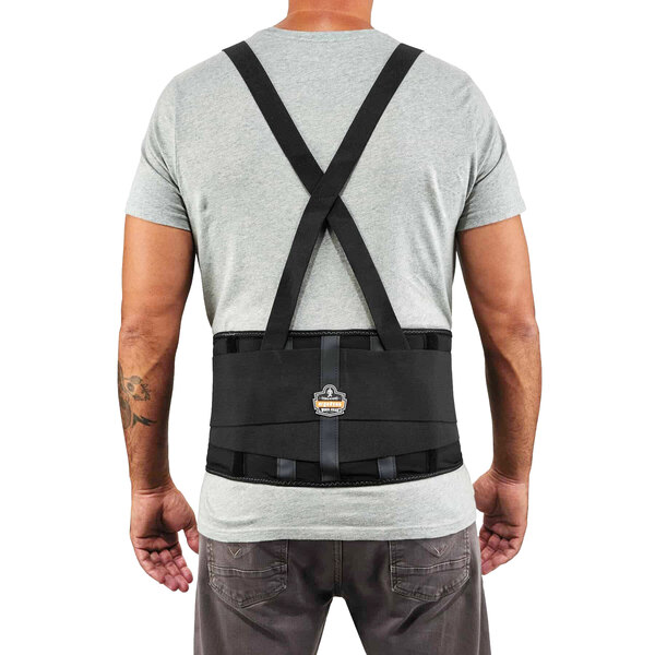 A man wearing a black Ergodyne ProFlex 100 back support belt.