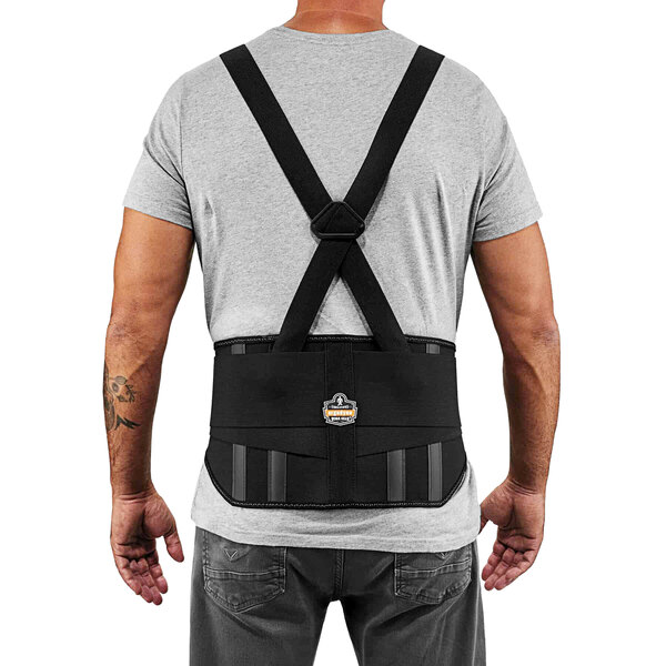 A man wearing an Ergodyne ProFlex black elastic back support brace.