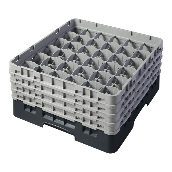 A black plastic glass rack with many small compartments and extenders.