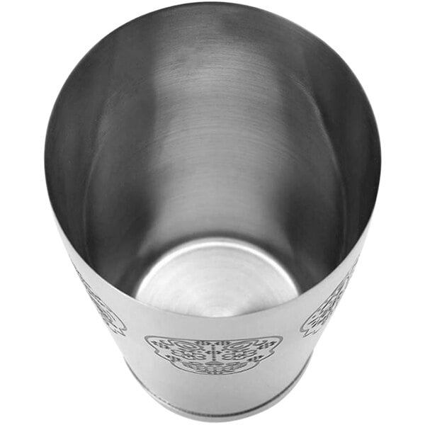 A silver stainless steel Barfly cocktail shaker with a skull design on it.