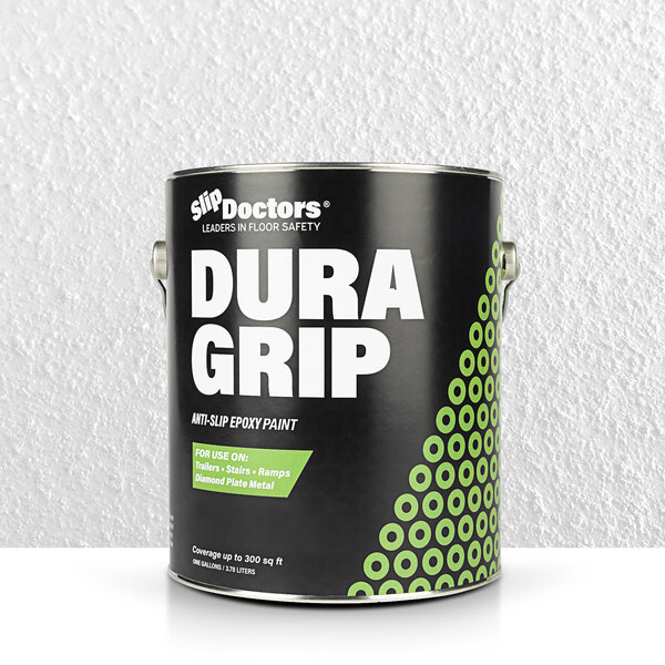 A black can of SlipDoctors Dura Grip with white text and green circles.