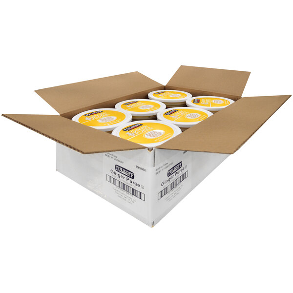 A case of Tulkoff Ginger Puree with a yellow and white label.