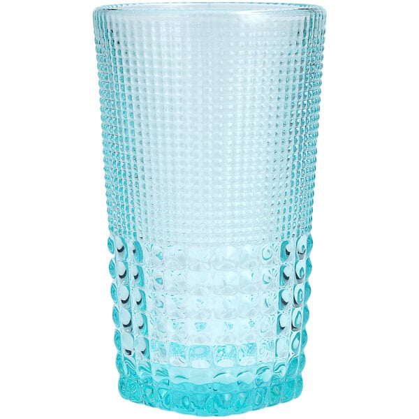 A close up of a Fortessa Pool Blue Beverage Glass with a textured pattern.