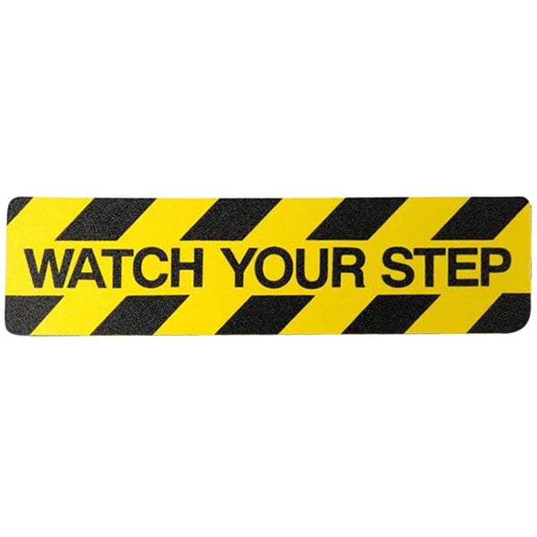 A black and yellow striped "Watch Your Step" sign.