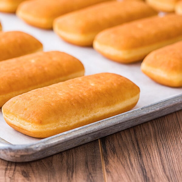 A tray of Rich's unfilled Long John yeast donuts.