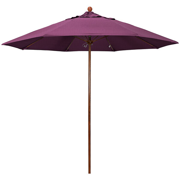 A purple umbrella with a wooden pole and Sunbrella canopy.