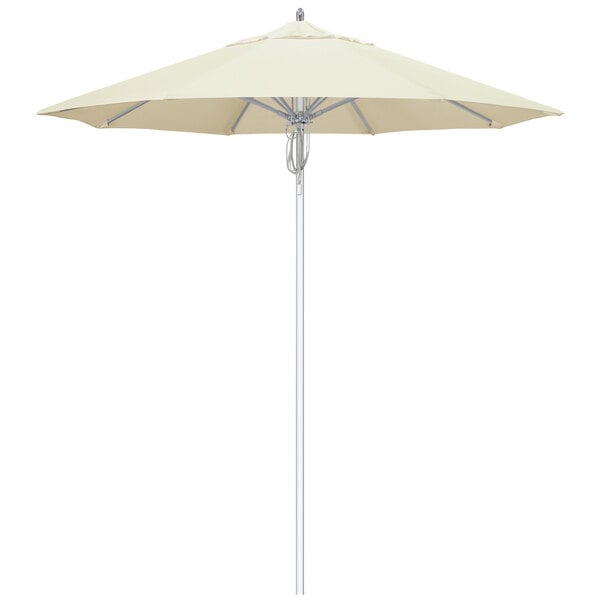 A white California Umbrella with a silver pole.