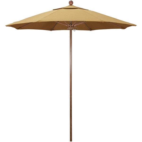 A close-up of a California Umbrella with a Sunbrella wheat fabric canopy and an American oak aluminum pole.