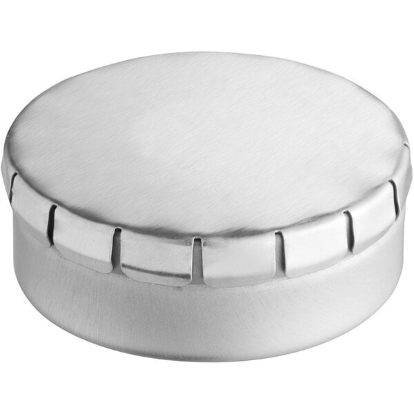 A round silver metal tin with a push and pop lid.