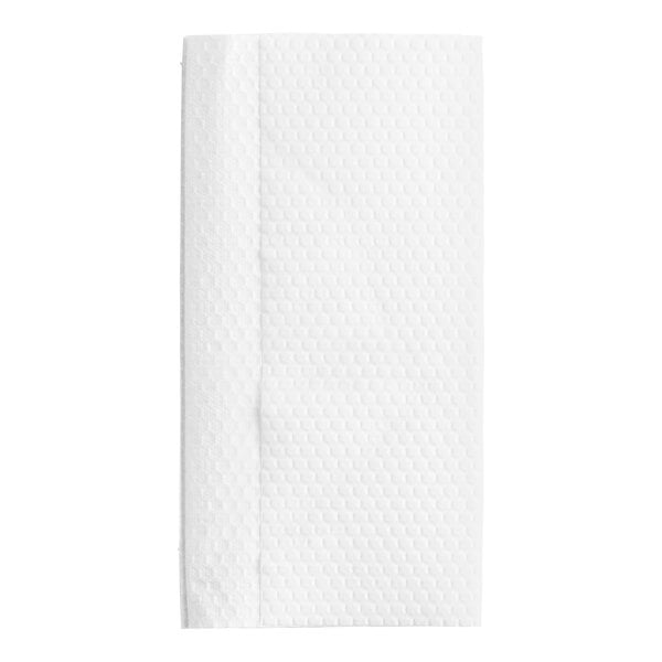 A close-up of a white paper towel in a pop-up box.