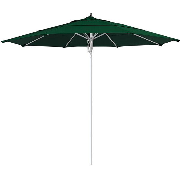 A green California Umbrella with a silver pole.