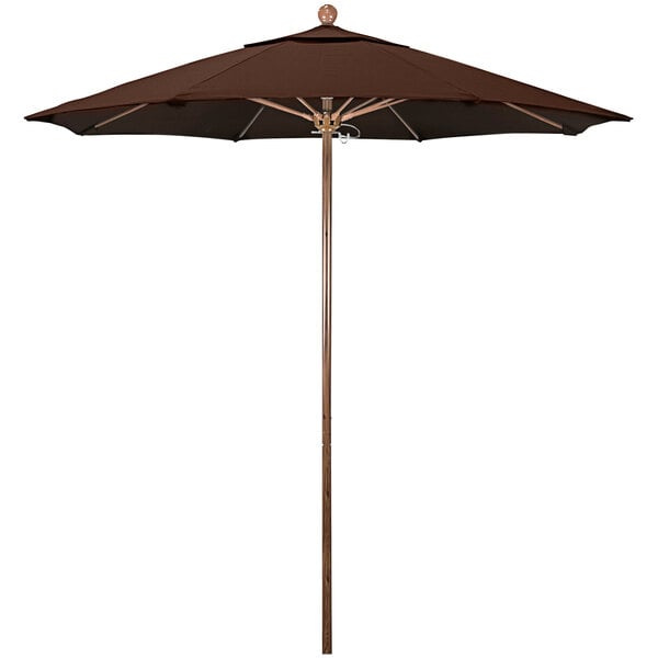 A close-up of a brown California Umbrella with a wooden pole.