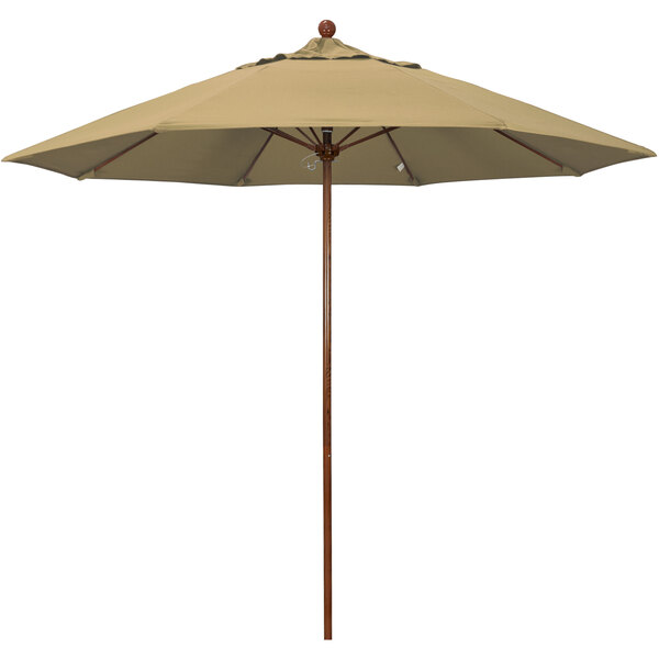 A tan California Umbrella with a wooden pole.