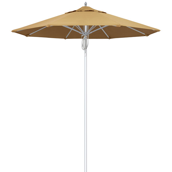 A close-up of a wheat Sunbrella umbrella with a silver pole.