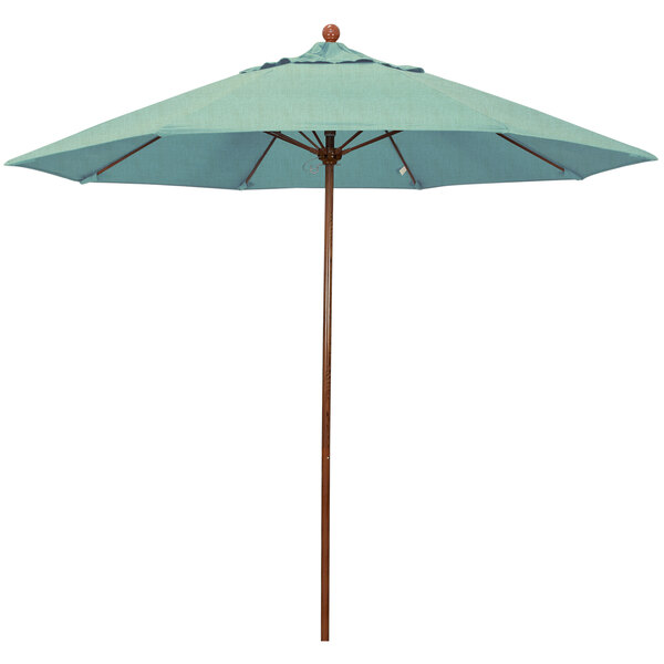 A close-up of a blue California Umbrella with a wooden pole. The canopy is a spa blue color.