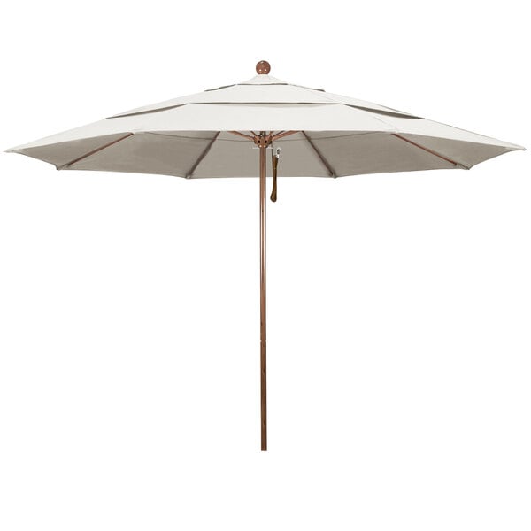 A white umbrella with a wooden pole.