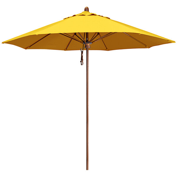 A California Umbrella yellow Sunbrella canopy with a wood pole.