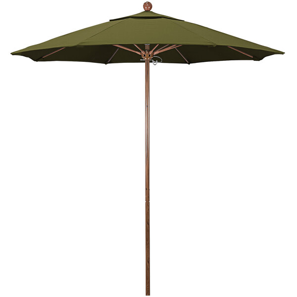 A green California Umbrella with a wooden pole.