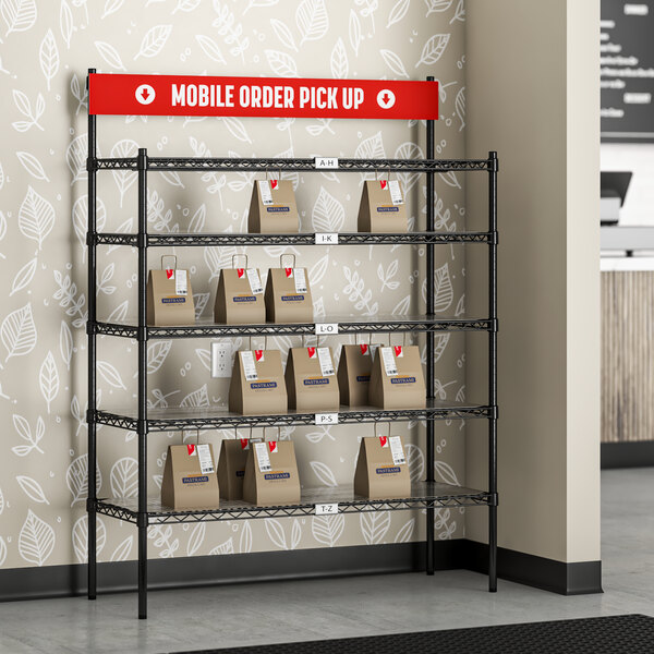 A Regency shelving unit with a red sign for take-out bags on it.