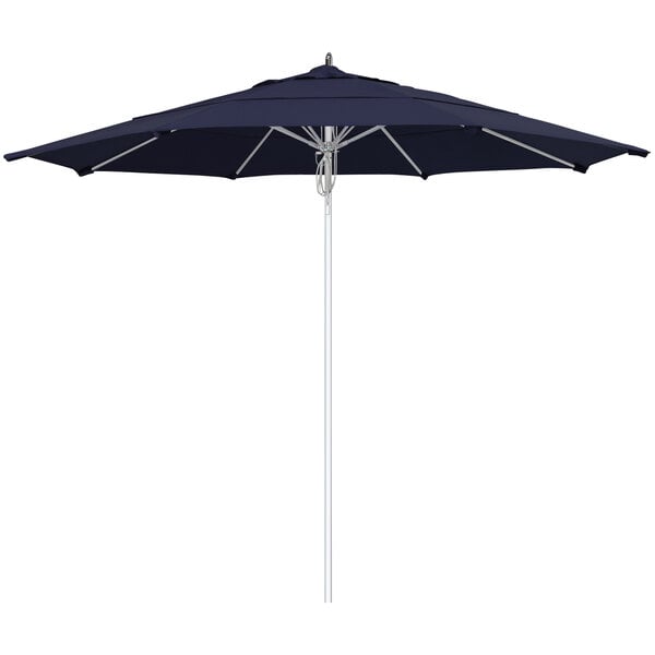 A navy blue California Umbrella with a silver pole.